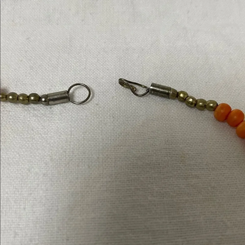 Vintage Orange Beaded Necklace with Gold Accents 14” long.